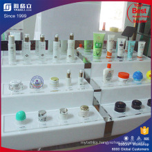 OEM Luxury Clear Acrylic Cosmetic Products Display Stand